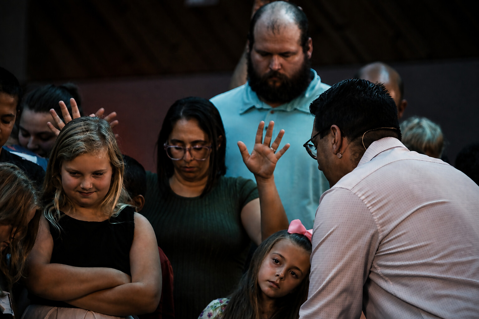 Organic Kids gathered at the front to be prayed over